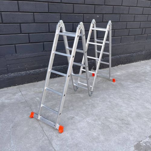 Алюмінієва чотирьохсекційна шарнірна драбина трансформер 4 х 5 сходинок