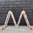 Драбина трансформер алюмінієва чотирисекційна шарнірна 4 x 3 сходинки